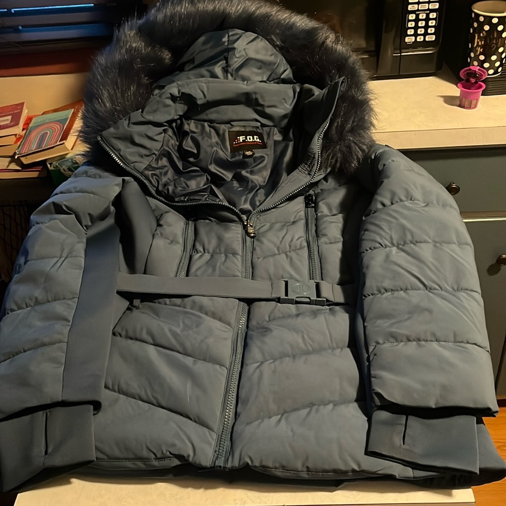 Teal , mid length , size large women’s winter jacket.